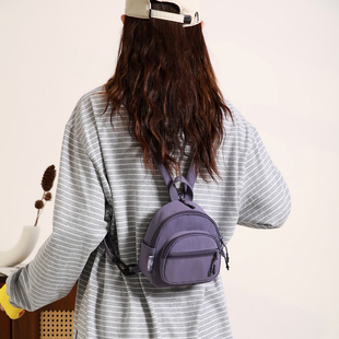 多用小巧背包女2026春季新款双肩包多口袋迷你牛津布防水斜挎胸包