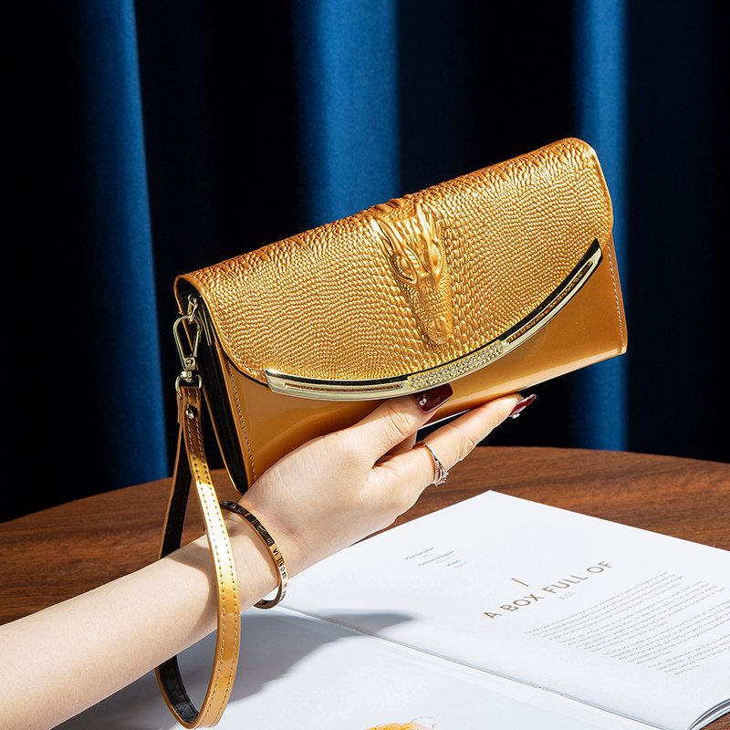 金色旺财大容量真皮手拿包有卡位宴会手包2026春季新款牛皮链条包