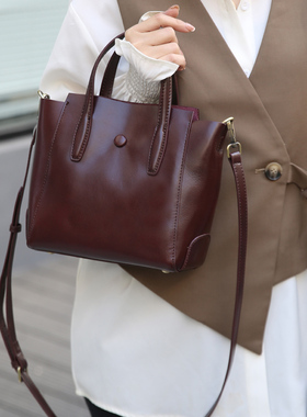 时尚简约真皮单肩斜挎包女百搭2026冬季新款软牛皮竖款手提托特包