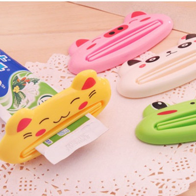 创意挤牙膏神器懒人剂洗面奶化妆品挤压器手动牙膏器按压器牙膏夹