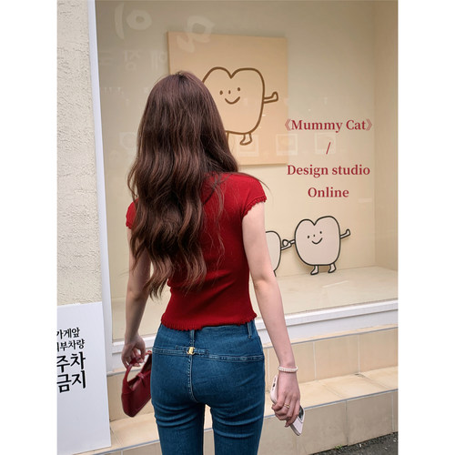 深蓝色蜜桃臀弹力微辣牛仔裤