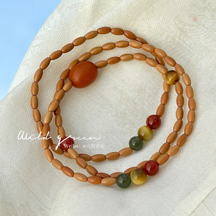 有野青青「兰花娘子」原创中式设计橄榄核米珠双圈蜜蜡文玩手串