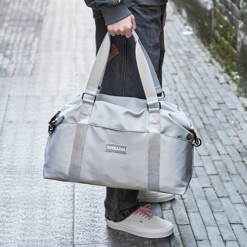 手提旅行包男大容量行李包防水