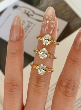 隆隆金 S925银镀金色椭圆6*8mm单钻戒指女简约唯美星芒女戒指环