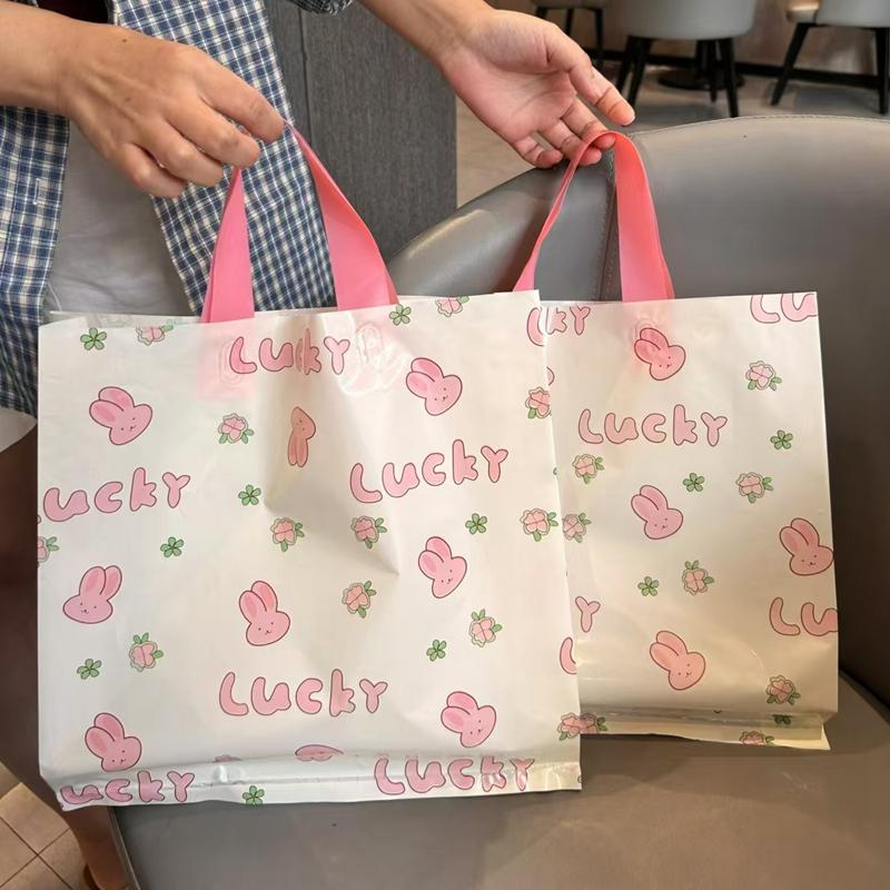 塑料儿童女装服装店用手提袋服饰包装礼品卡通可爱定制logo高档袋