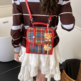 中大童可爱格子款手提双肩包男女童可爱公仔时尚外出背包研学书包