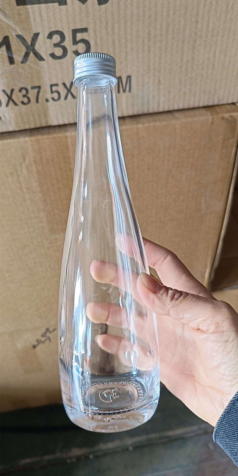 330ml500ml矿泉水瓶白酒瓶酵素红酒瓶 透明厚1斤装原浆酒玻璃空瓶图片