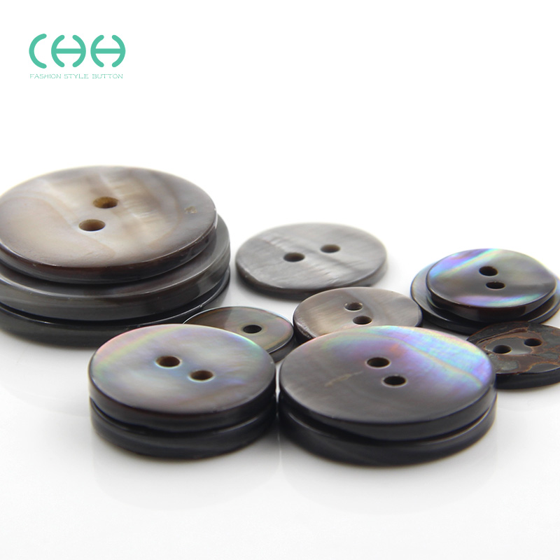 圆形衣服两眼贝壳纽扣女黑色衬