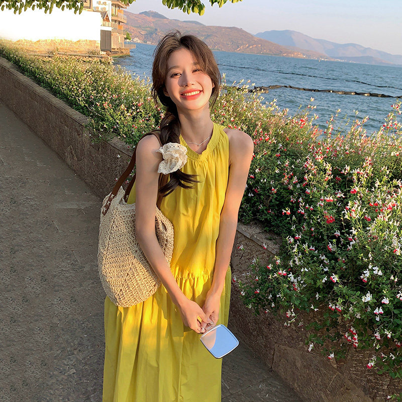 黄色连衣裙高端气质女2025新款夏季海边度假风宽松无袖长款A字裙图片