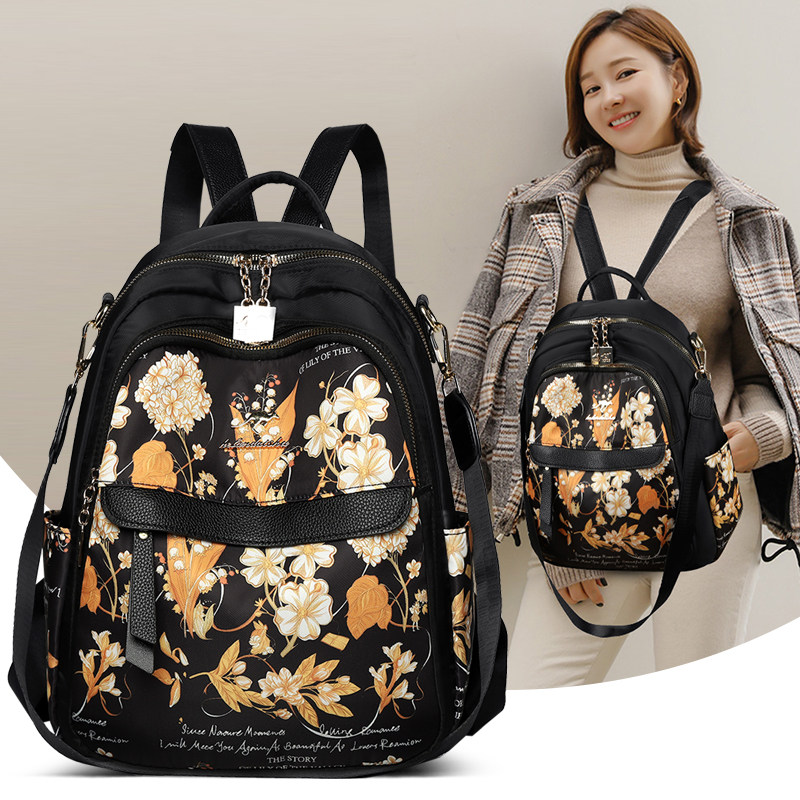 双肩包女2026新款潮旅行牛津布背包女士百搭时尚印花帆布包书包包