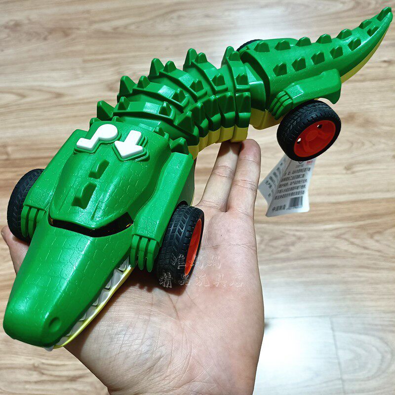 儿童机械鳄鱼战骨车塑胶男孩电动益智灯光音乐爬行扭动前进玩具车