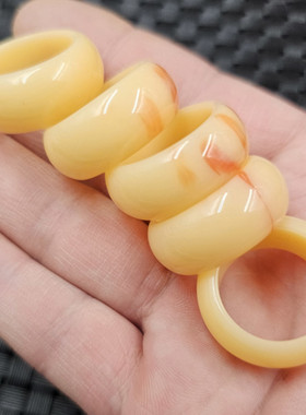 人造蜜蜡浅黄色戒指蜜蜡飘红色