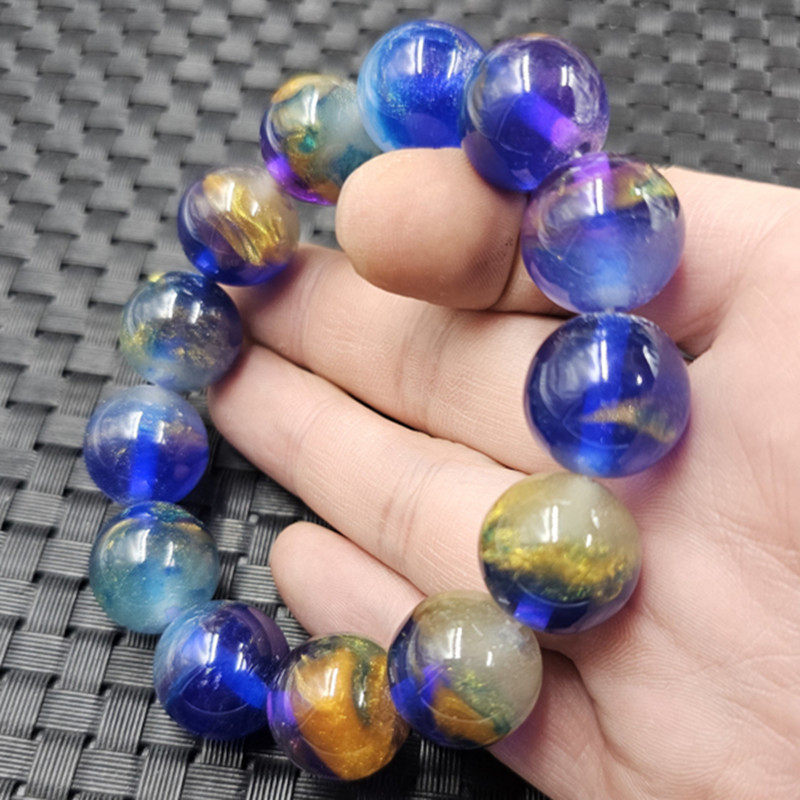 荧光浮盐水蓝珀手链荧光蓝精灵手链人造蜜蜡琥珀大小号男女手串