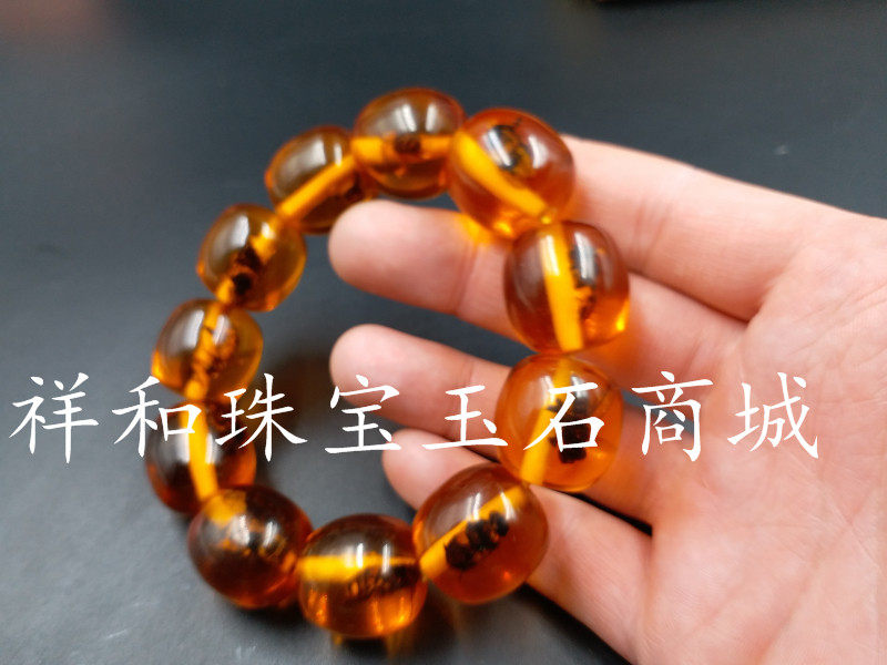 厂家直销 新款人造琥珀桶珠手链 琥珀内置蜜蜡路路通手链 手串