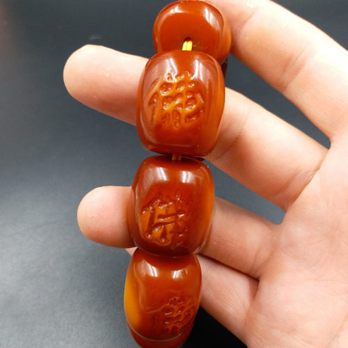 高档精美新款蜜蜡佛字路路通手链