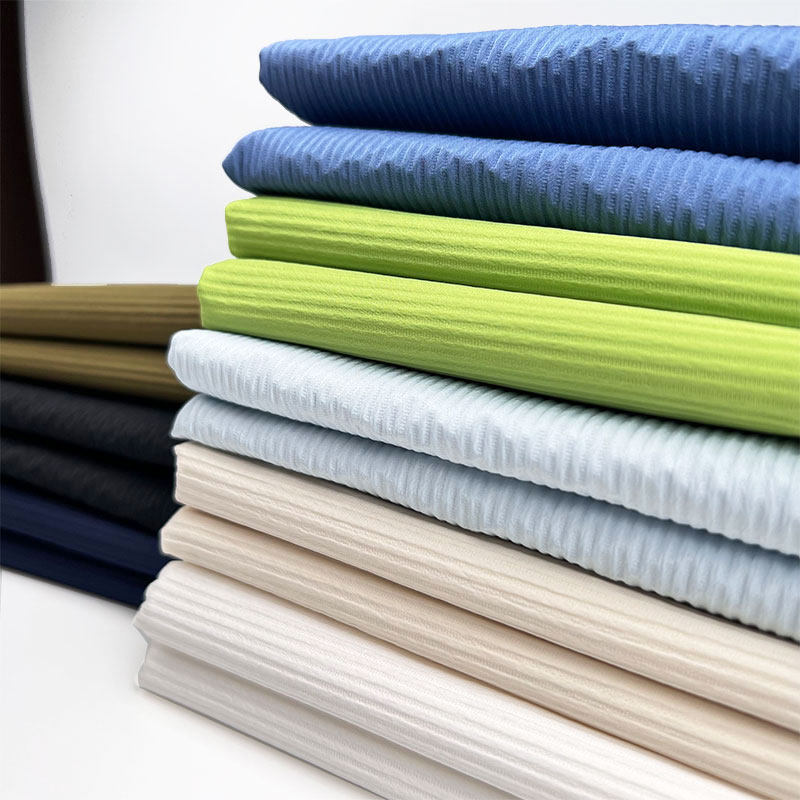 2023年新款T400竖条纹丽人条羽绒服布料秋冬马甲夹克轻薄棉服面料