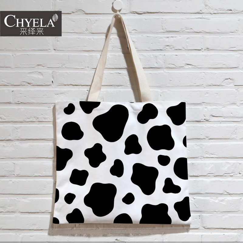 奶牛纹可爱清新帆布包ins超火的潮流街头女生购物袋单肩手提AK74在类目 收纳整理, 家庭收纳用具, 收纳袋, 购物袋/环保袋中 - 来自Buy2taobao.com提供专业的淘宝代购服务