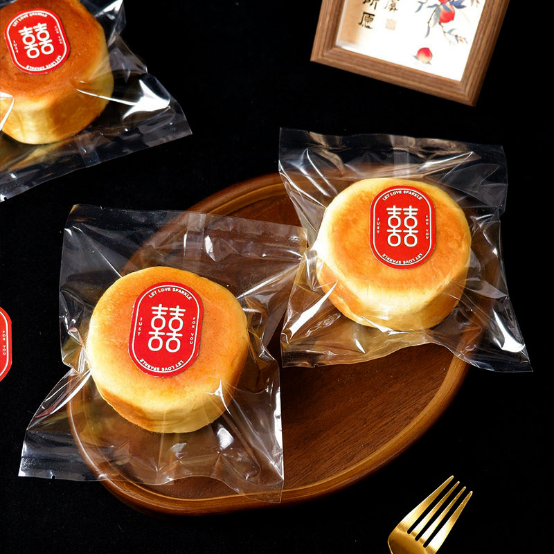 喜饼包装袋乳山喜饼紫米饼机封袋图片