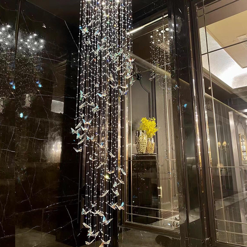 复式楼旋转楼梯长吊灯客厅中空别墅简约现代酒店大堂工程水晶灯具