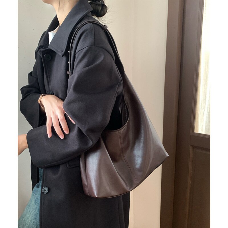 旅行通勤软羊皮托特包女2026新款复古感hobo包真皮单肩包大容量