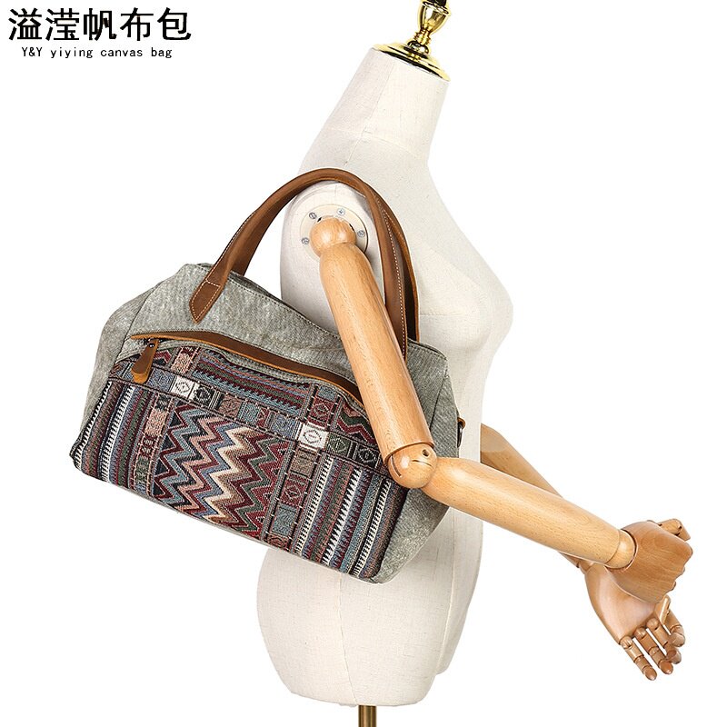 旅行通勤防水帆布配头层皮女单肩包民族风花纹复古跨境手提包溢滢