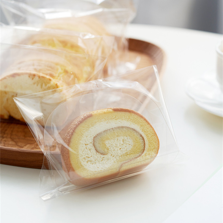 透明蛋糕卷分隔膜片瑞士卷切件包装袋围边膜片梦龙卷底托打包袋慕,厨房/烹饪用具,点心包装盒/包装袋,淘宝优惠券,粉丝福利购,淘宝优惠卷