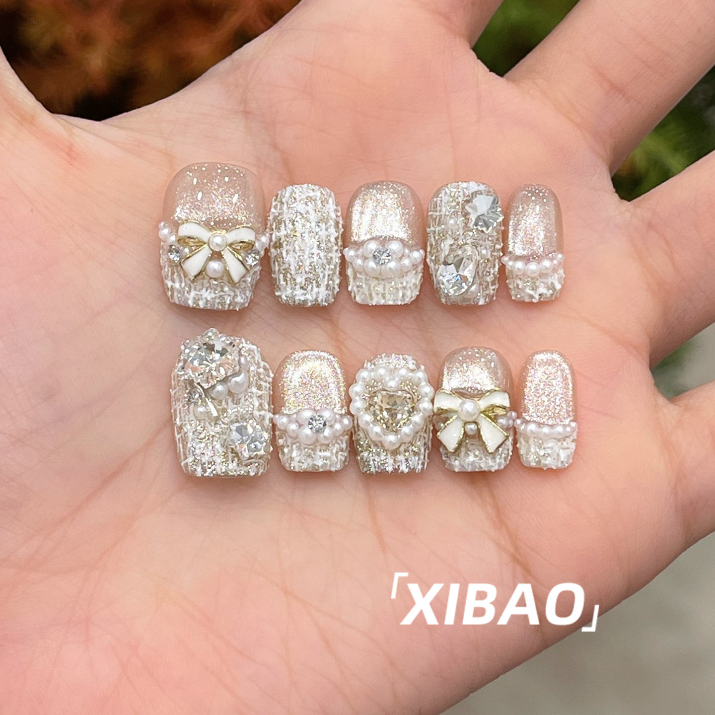 纯手工不掉钻重工珍珠穿戴甲图片