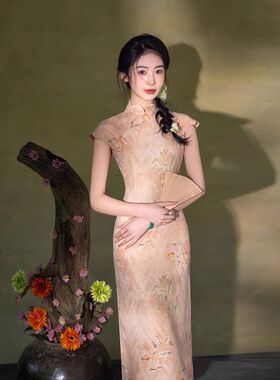 曼玉优雅无袖连衣裙气质旗袍新中式印花橙色国风新款女2026高级感