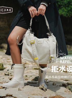 UNICARE慵懒风单肩背包女运动休闲J饺子包福袋包云朵包大容量2025