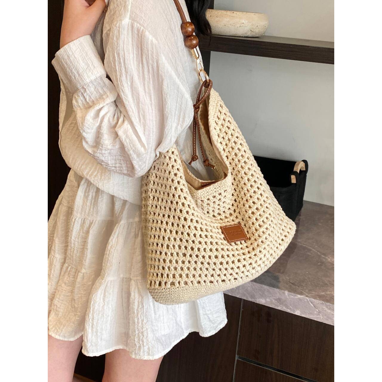 官方品牌夏天洋气镂空编织托特包包女2026新款休闲手提草编包大容