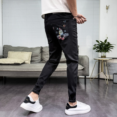 黑色男士牛仔裤修身小脚长裤子