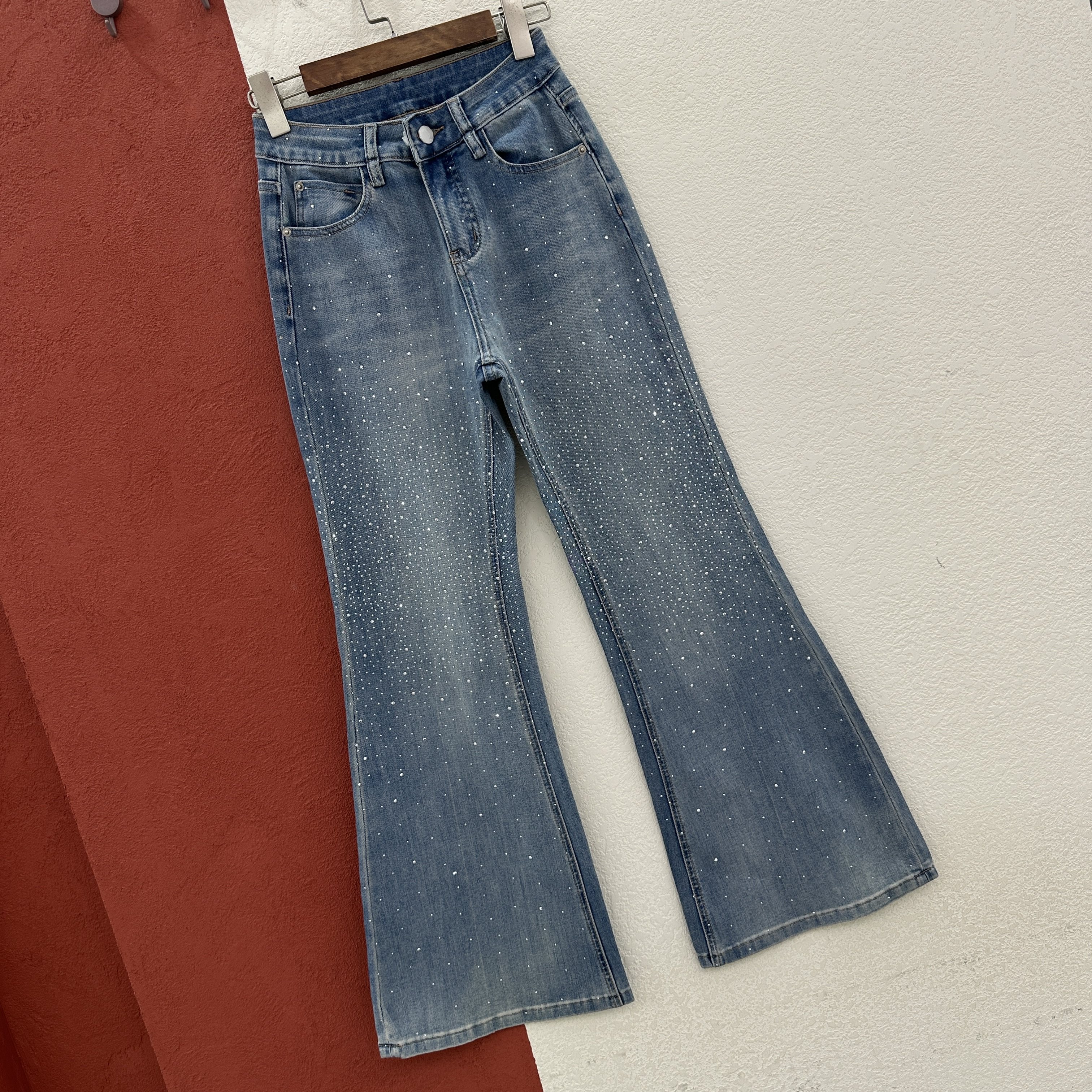 春款JEANS韩酷莱66217牛仔裤女式浅蓝色流星烫钻喇叭裤垂感微喇裤