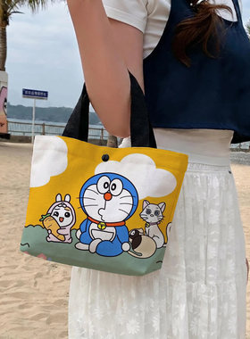 哆啦A梦卡通帆布手提包女可爱小方包环保购物袋方格绒托底小包