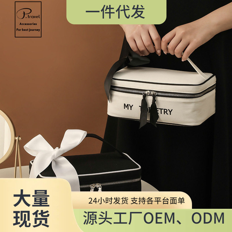简约旅行新款便携大容量化妆收纳包纯棉帆布防水轻奢少女化妆包