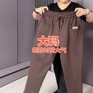 春季宽松休闲女加肥加大码纯色松紧腰抽绳大兜哈伦裤子遮肉长裤潮