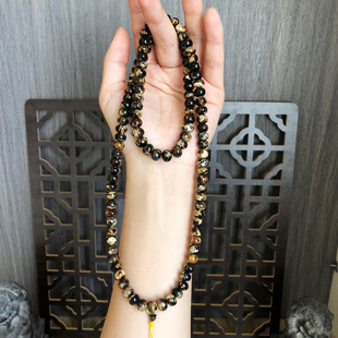 29.88一级黑花熊猫花8mm天然抚顺琥珀花珀干白蜡瓷白琥珀蜜蜡手链