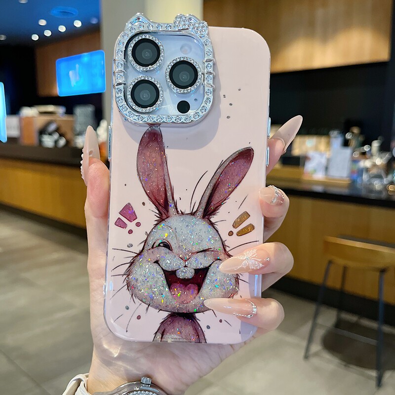 适用苹果系列iPhone16新款手机壳15/14promax创意风卡通开心兔子13/16promax猫耳型满边钻框闪钻镜头膜保护套