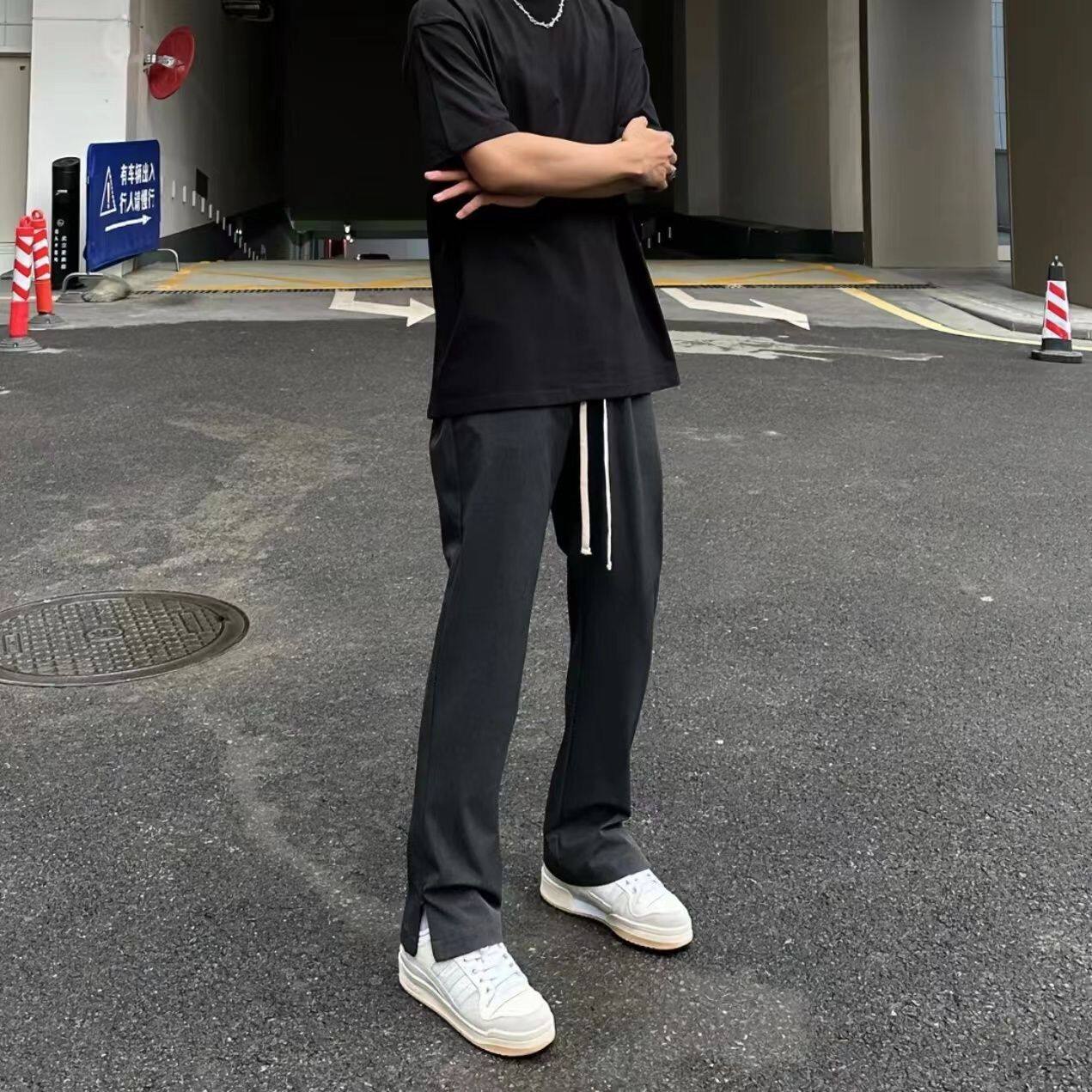 利落混纺西裤脚口开叉宽松长裤男图片