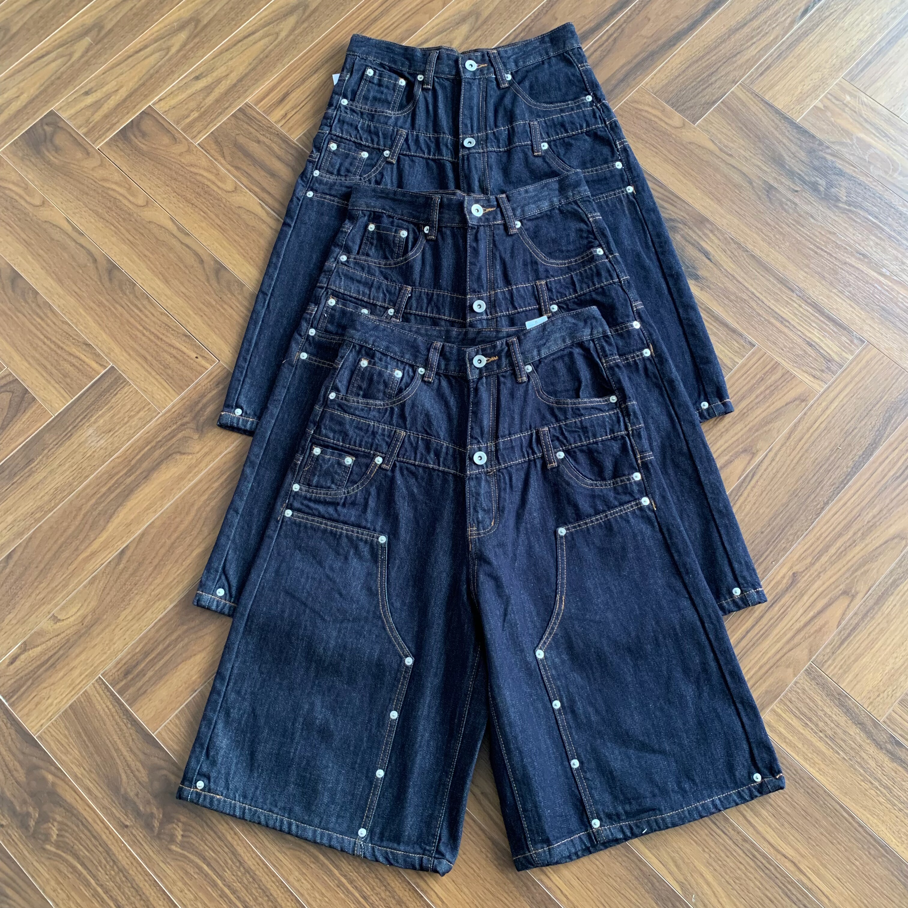 美式vintage复古水洗撞钉拼接伐木裤设计感解构双腰头7分牛仔裤男