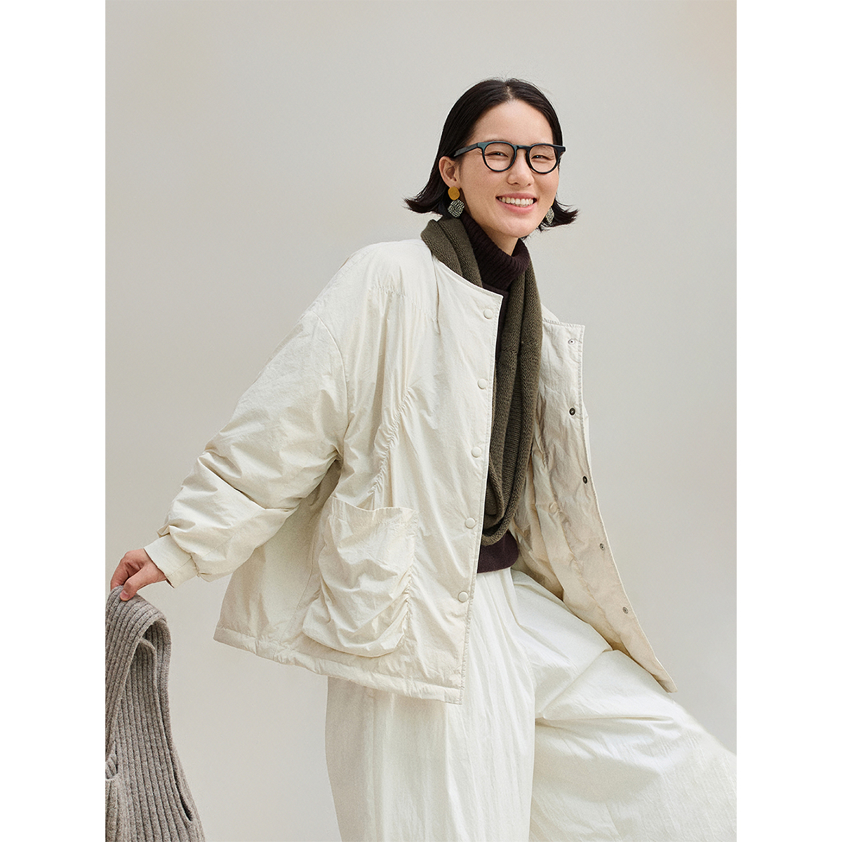 90白鹅绒抽皱松紧褶设计羽绒服