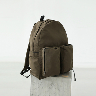 麻霖定制橄榄绿真皮拼接城市轻运动户外休闲轻巧便携书包双肩包