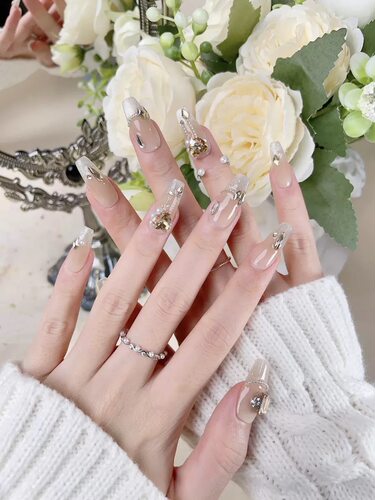 Champagne Diamond Long Almond Nails