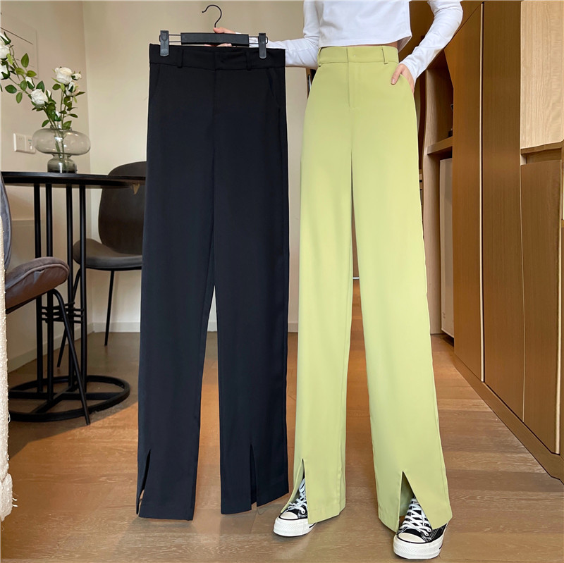 Women's straight suit pants with wide legs and split ends