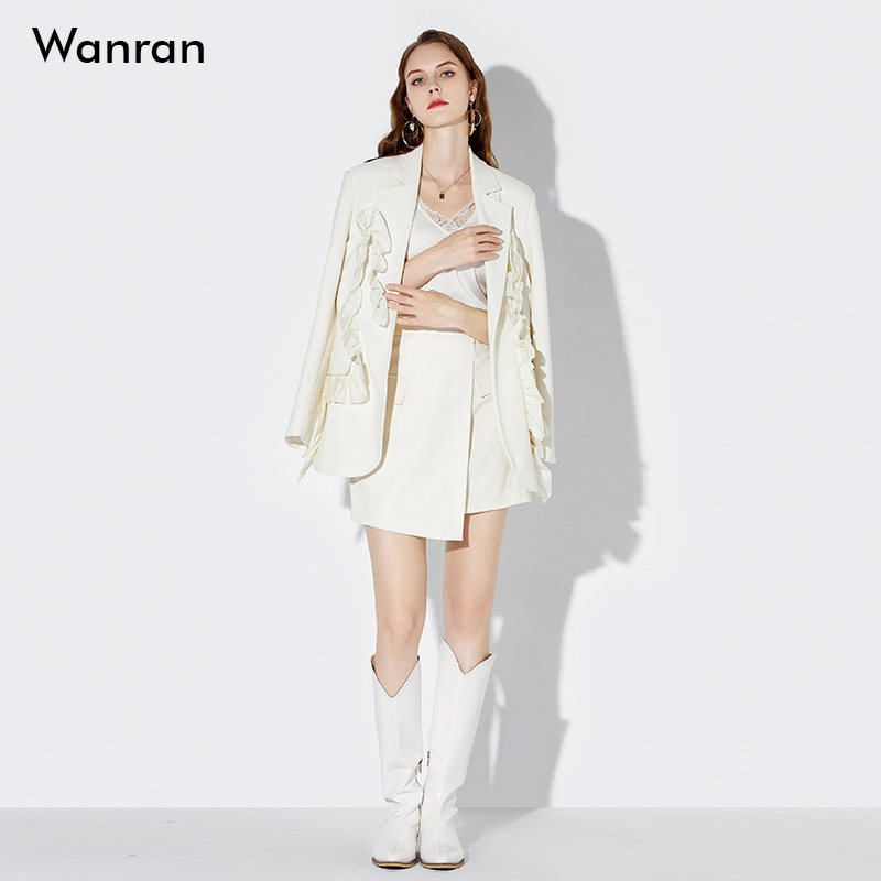 春装女装2026新款气质两件套浅杏色小西装外套短裙套装潮