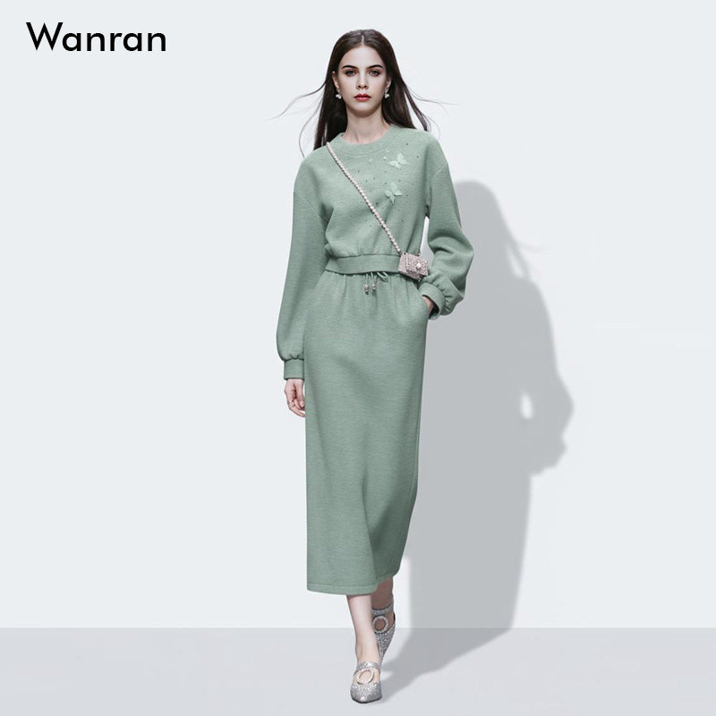 2026春季新款时尚减龄蝴蝶装饰灯笼袖针织卫衣+高腰直筒半裙套装