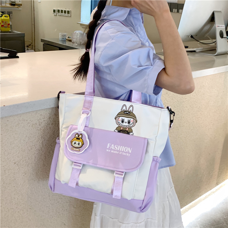 斜挎包女初中生大容量少女生单肩儿童补课小学生补习手提袋拎书包