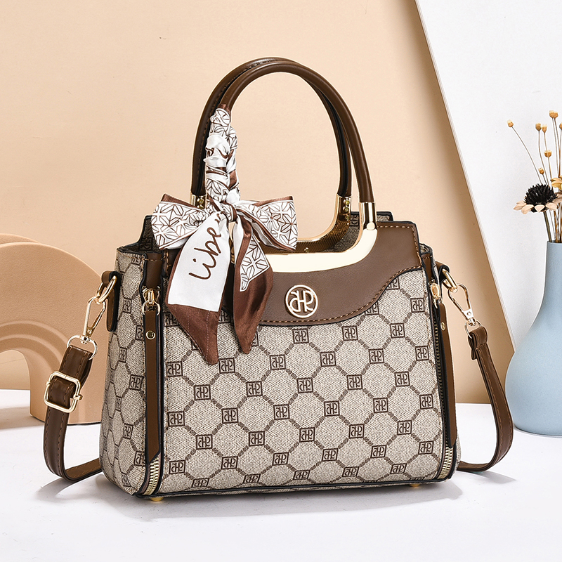 时尚百搭印花单肩女包单肩水桶包