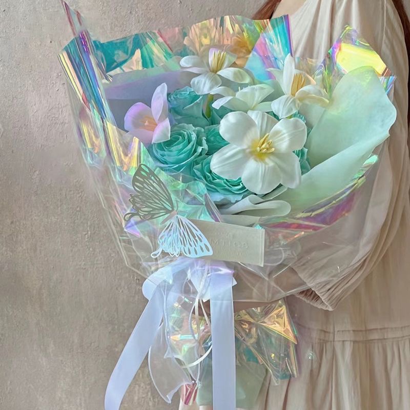 彩虹镭射幻彩膜炫彩膜透明纸渐变防水彩色玻璃纸鲜花礼品包装材料