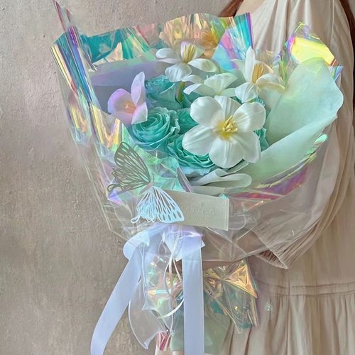 彩虹镭射幻彩膜炫彩膜透明纸渐变防水彩色玻璃纸鲜花礼品包装材料