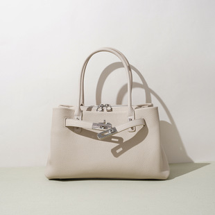 2026年早春通勤感包头层牛皮简约百搭单肩斜挎手提凯丽包